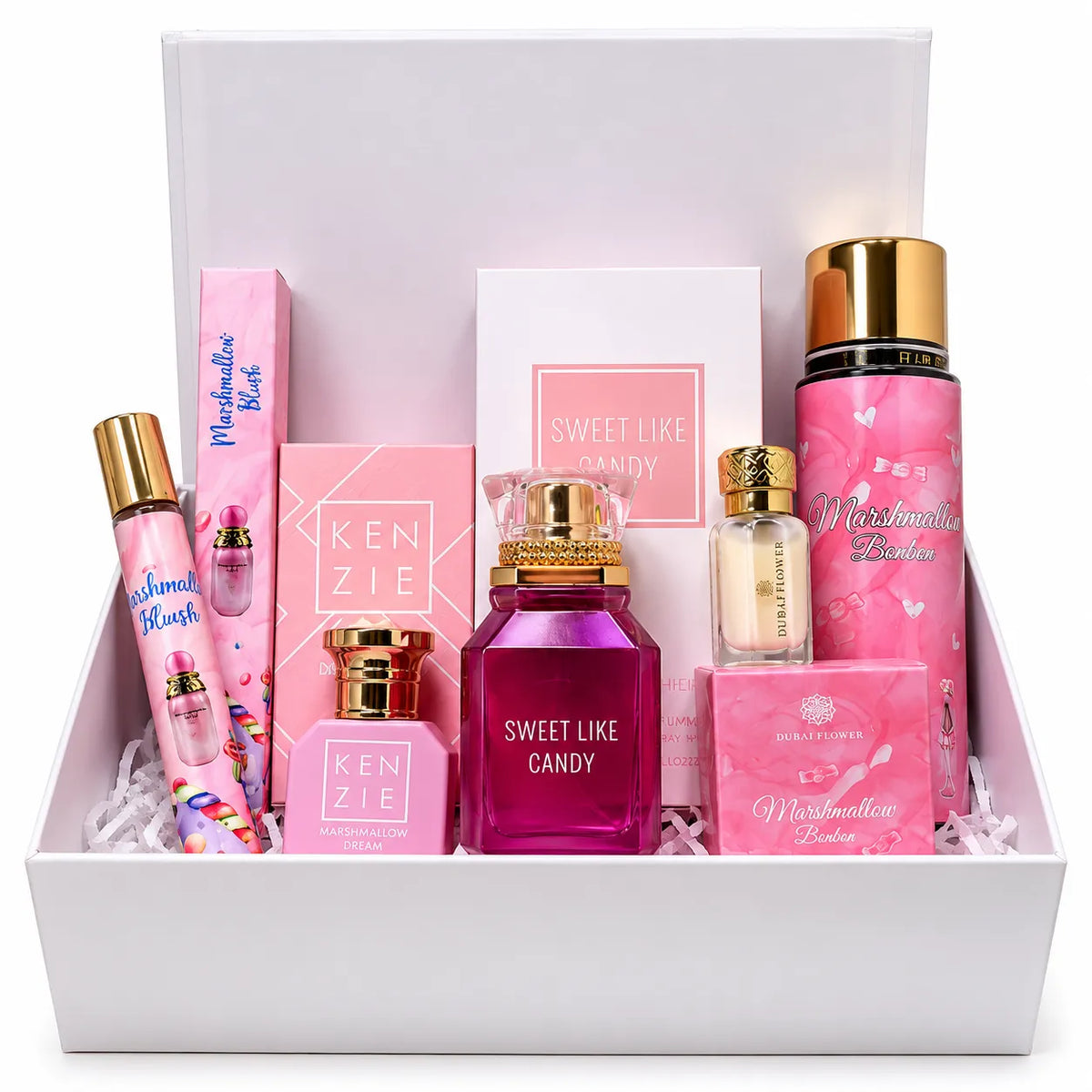Coffret parfum femme Pink Candy réunissant Sweet Like Candy Gulf Orchid, Kenzie Marshmallow Dream Volaré, Marshmallow Bonbon Dubai Flower et Marshmallow Blush, dans un coffret cadeau rose.